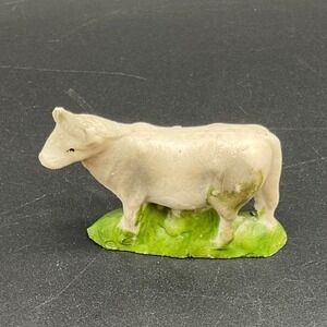 Vintage Japan Painted Celluloid Cow Figurine Folk‎ White Green Base Decorative